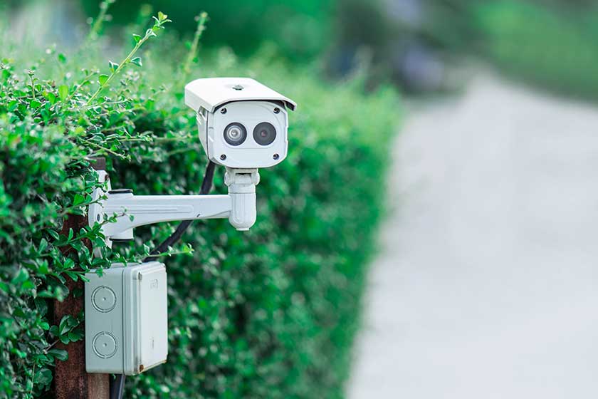 CCTV security camera in car park at garden